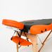 Масажний стіл RelaxLine Titan, дерев`яна основа, чорно-оранжевий Фото 4